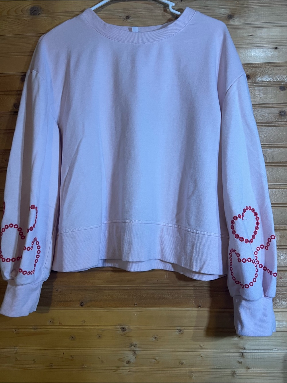 Jane and Delancey Light Pink Crewneck Sweatshirt with Red Heart Sleeve Details